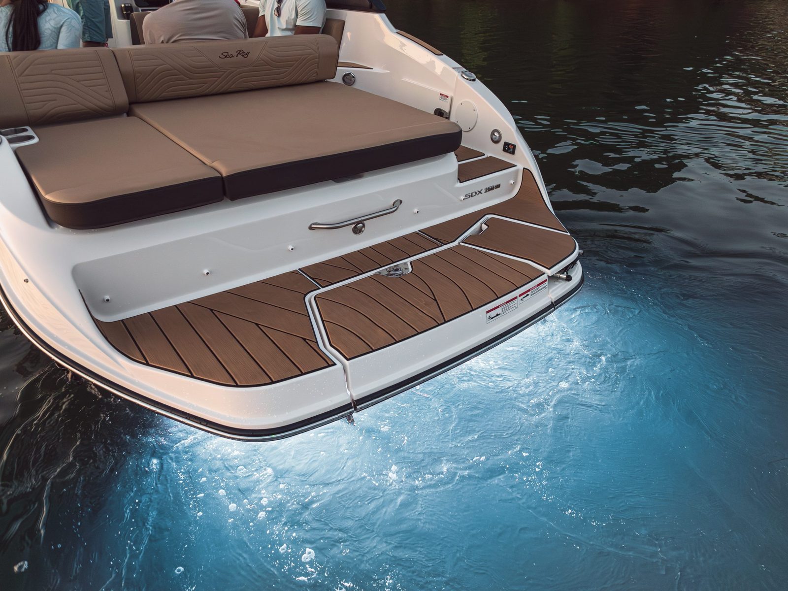 Faux teak EVA swim platform on a sport boat